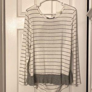 Super soft, white and gray-striped knit blouse.